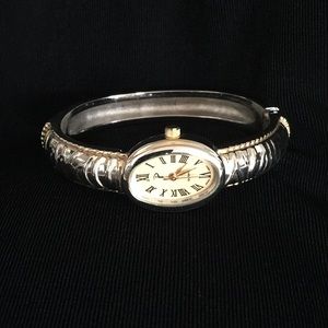 Vintage “PL” Women’s Quartz Bangle Watch